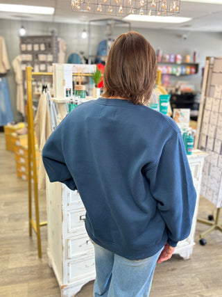 Back view of the dark blue Midwest Cozy Sweatshirt