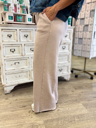 Model wearing ash mocha colored sweatpants