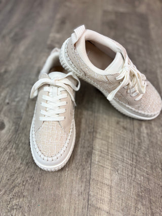 Neutral canvas sneakers with tie strings