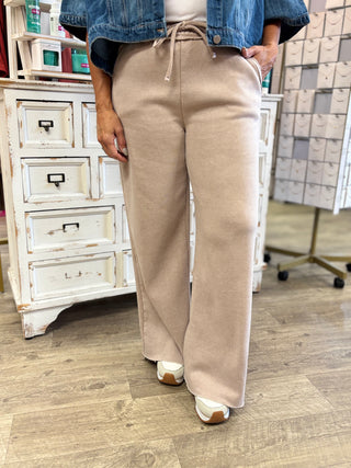Model wearing ash mocha colored sweatpants
