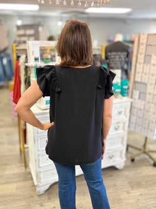 Ruffle Worthy Black Top