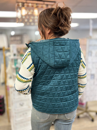 Quilt Trip Teal Hooded Vest in dark teal quilted knit