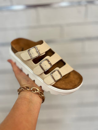 Cream colored, triple buckle, platform sandal