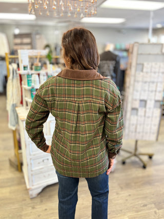 Back view of the Cabin Fever olive and chocolate brown plaid flannel shirt with corduroy collar, medium length and relaxed fit