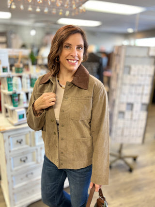 Front view of the Hay There taupe corduroy barn jacket showing the chocolate corduroy collar, snap front closure and patch pockets