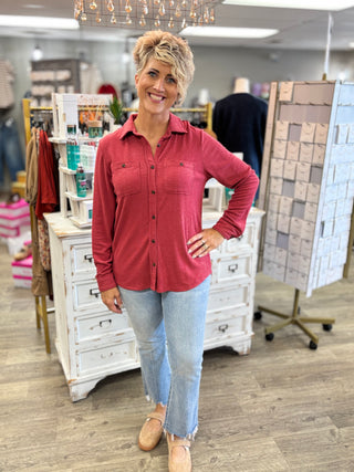 Model wearing a heather red button-up top with light-wash cropped jeans and tan loafers, shown in a full-length front view.